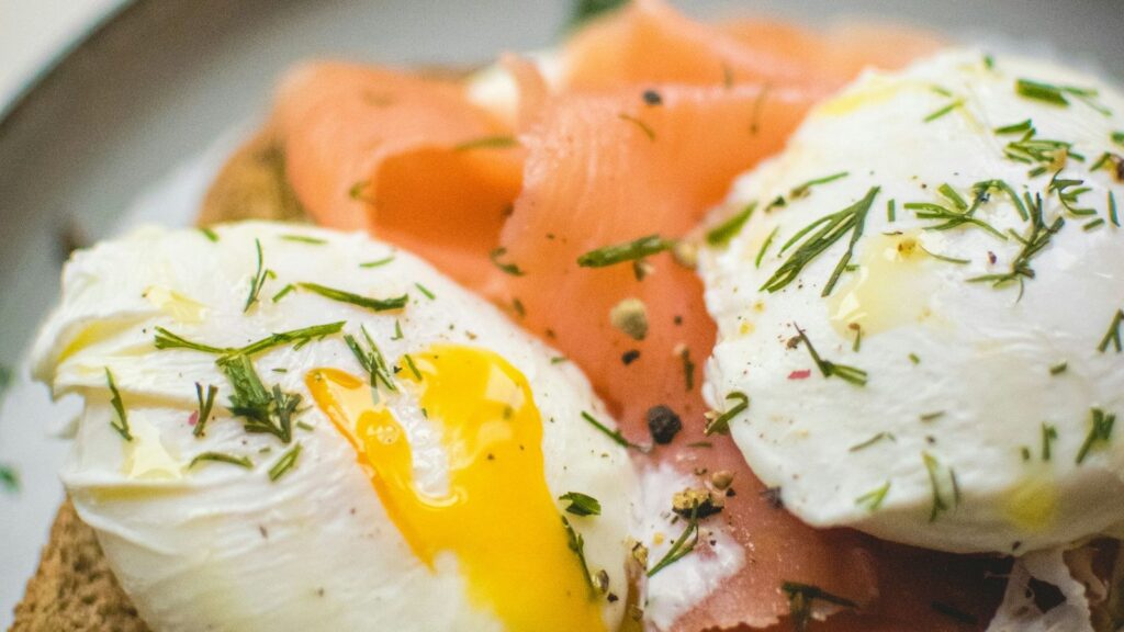 Poached eggs and smoked salmon on toast with a runny yolk